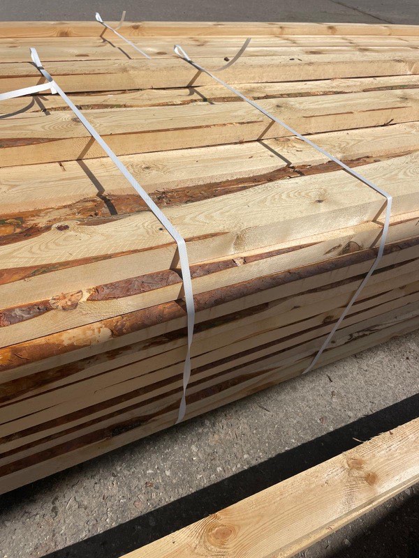 Bundle secured with strapping bands ready for transport